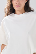 Camiseta crop top unicolor oversize con cuello redondo
