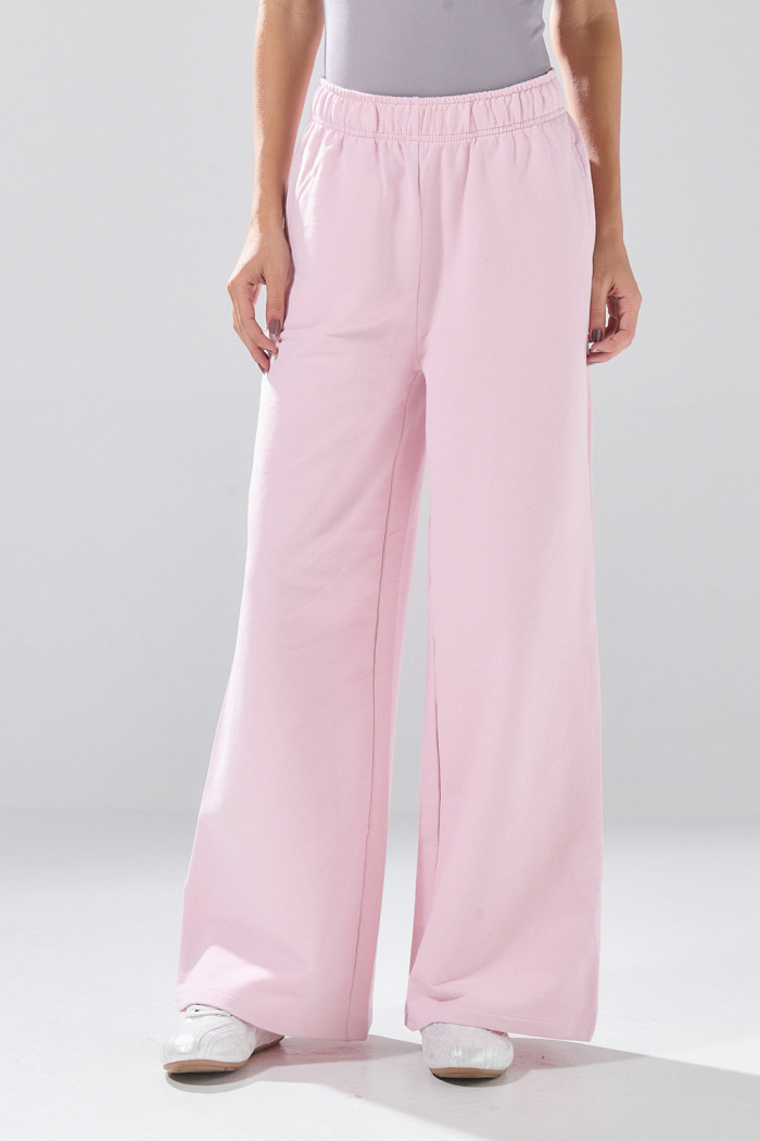 Pantalón unicolor jogger bota ancha con bolsillos laterales
