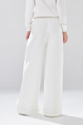 Pantalón unicolor jogger bota ancha con bolsillos laterales
