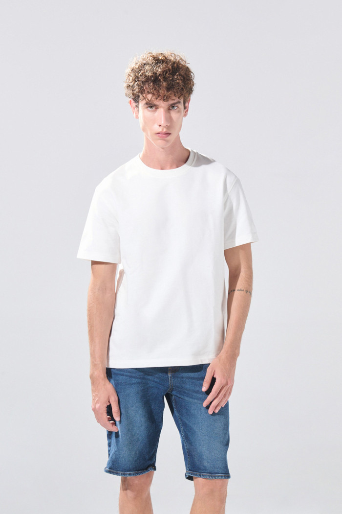 Bermuda infaltables slim de jean azul oscura con tiro bajo
