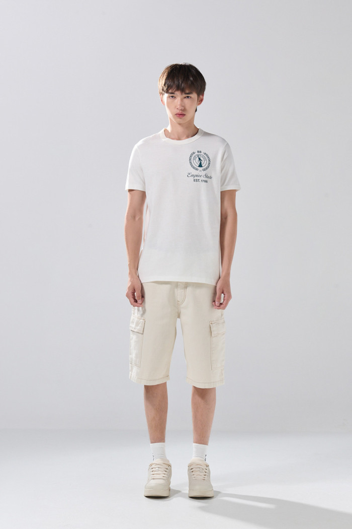 Camiseta oversize en tela pesada unicolor manga corta
