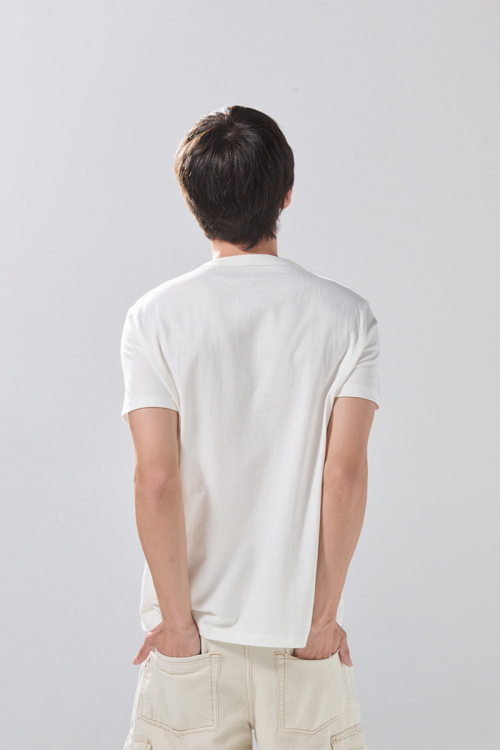 Camiseta oversize en tela pesada unicolor manga corta
