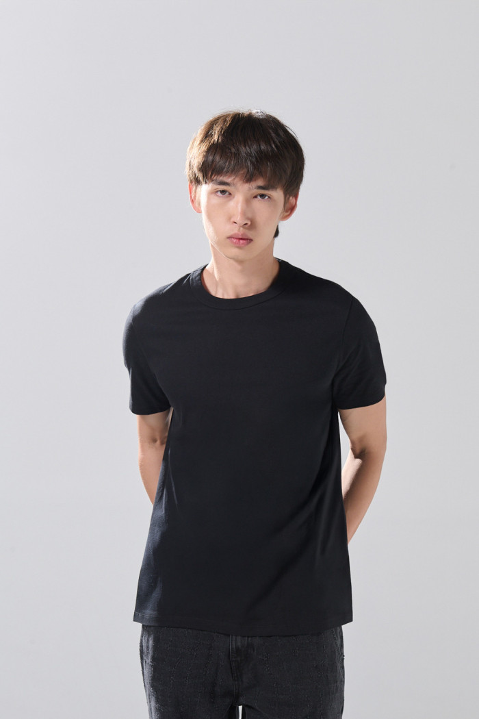 Camiseta unicolor cuello redondo infaltables en algodón
