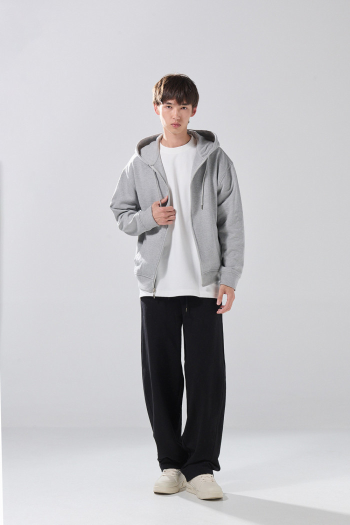 Buzo gris medio oversize con capota y cremallera
