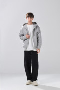 Buzo gris medio oversize con capota y cremallera
