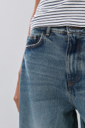 Jean azul oscuro baggy bota ancha con tiro medio y botón