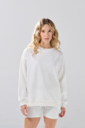 Buzo oversize cuello redondo unicolor con hombro caído
