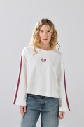 Buzo crema cuello redondo oversize con diseños college
