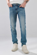 Jean azul medio slim 5 bolsillos con tiro bajo y desgastes
