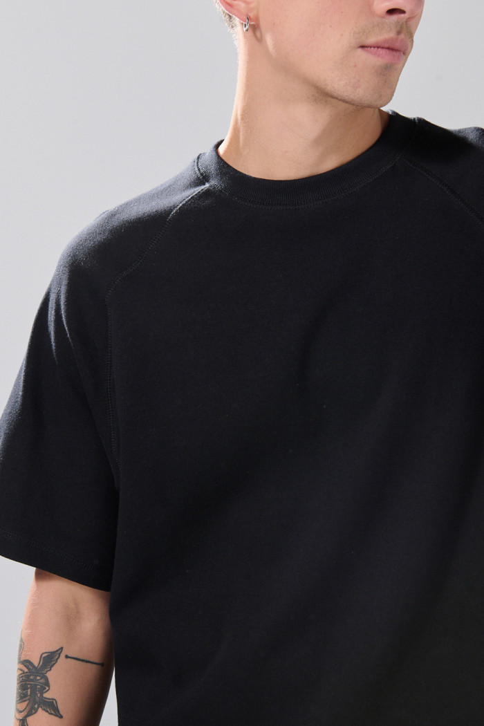Camiseta en algodón con manga ranglan corta unicolor
