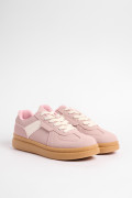 Tenis casuales unicolores con cortes y suelas planas