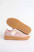 Tenis casuales unicolores con cortes y suelas planas