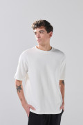 Camiseta unicolor oversize manga corta con corte posterior
