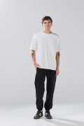 Camiseta unicolor oversize manga corta con corte posterior
