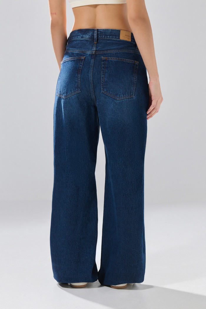 Jean infaltables baggy azul oscuro con bolsillos y bota ancha
