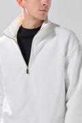 Buzo cuello alto oversize unicolor con cremallera
