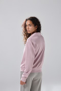 Buzo unicolor con hombro rodado y cuello polo
