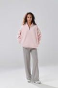 Buzo oversize cuello sport unicolor con cremallera
