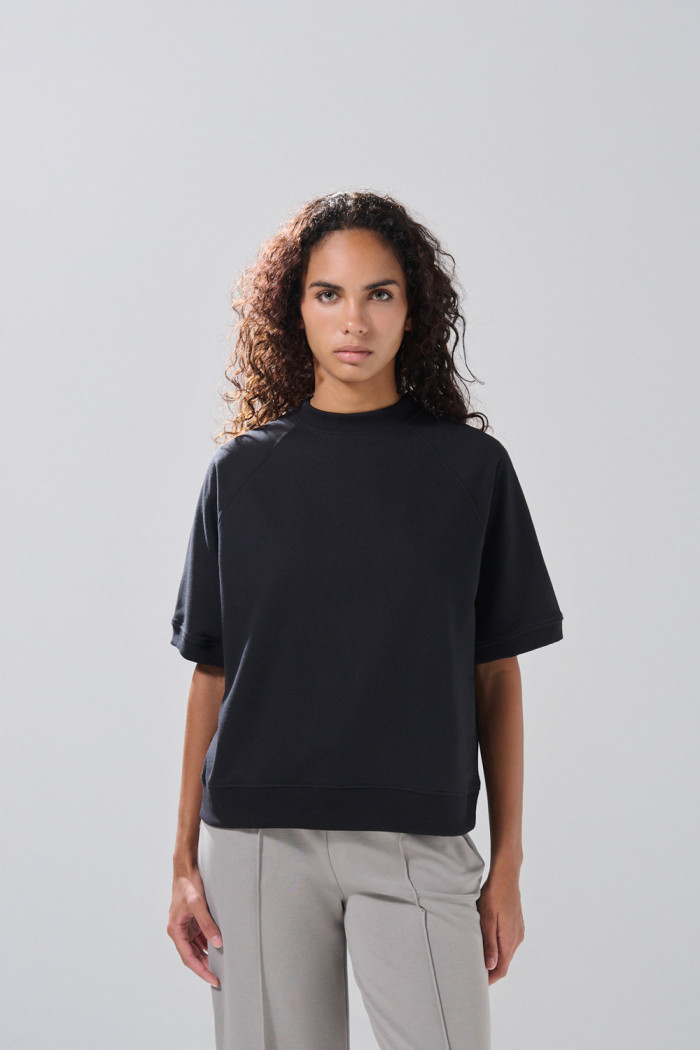 Camiseta manga ranglan corta unicolor oversize
