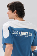 Camiseta oversize azul manga corta college con cortes 
