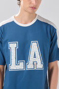 Camiseta oversize azul manga corta college con cortes 
