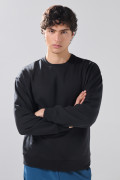 Buzo oversize cuello redondo unicolor en tela perchada
