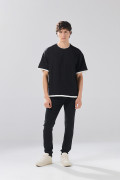 Jean infaltables negro skinny con tiro bajo y bolsillos
