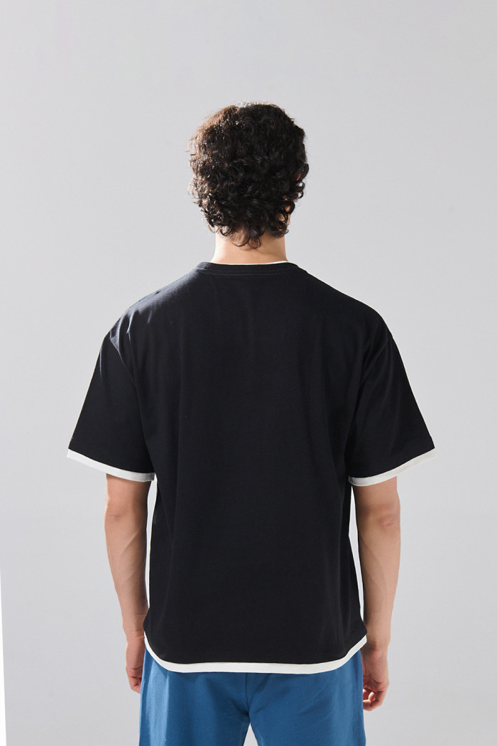Camiseta oversize con contrastes y manga corta unicolor
