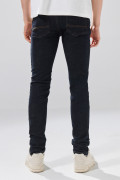 Jean azul intenso skinny infaltables con costuras y tiro bajo

