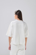 Camiseta unicolor manga corta oversize con corte posterior
