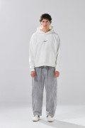 Buzo unicolor tie dye oversize con capota de Boho Club
