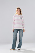 Buzo oversize cuello polo crema con diseño de Hello Kitty
