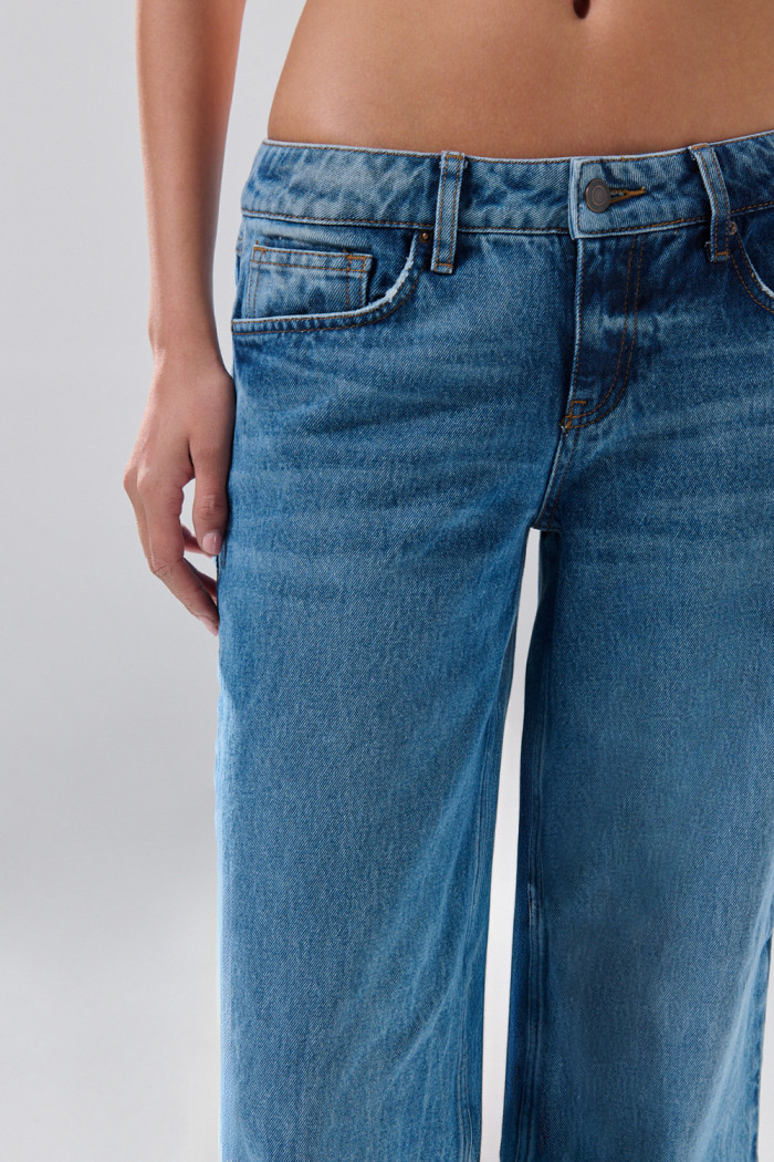 Jean open leg azul medio infaltables bota ancha con tiro bajo
