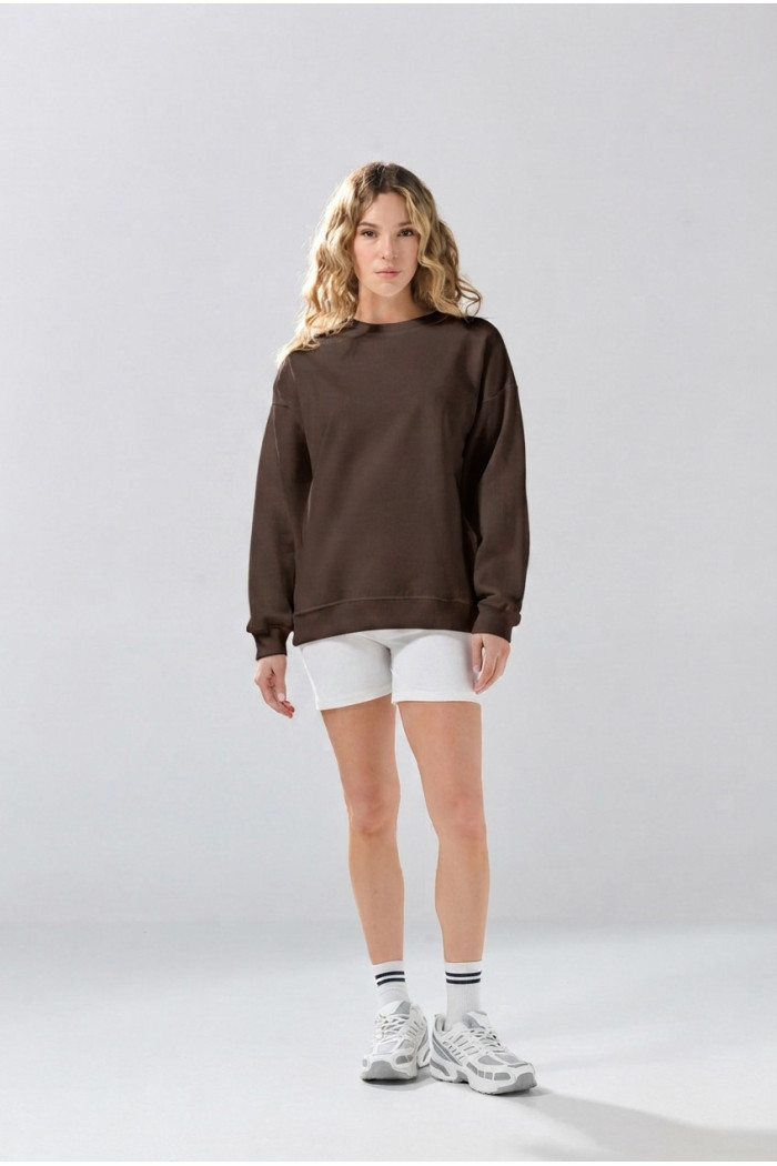 Buzo oversize cuello redondo unicolor con hombro caído
