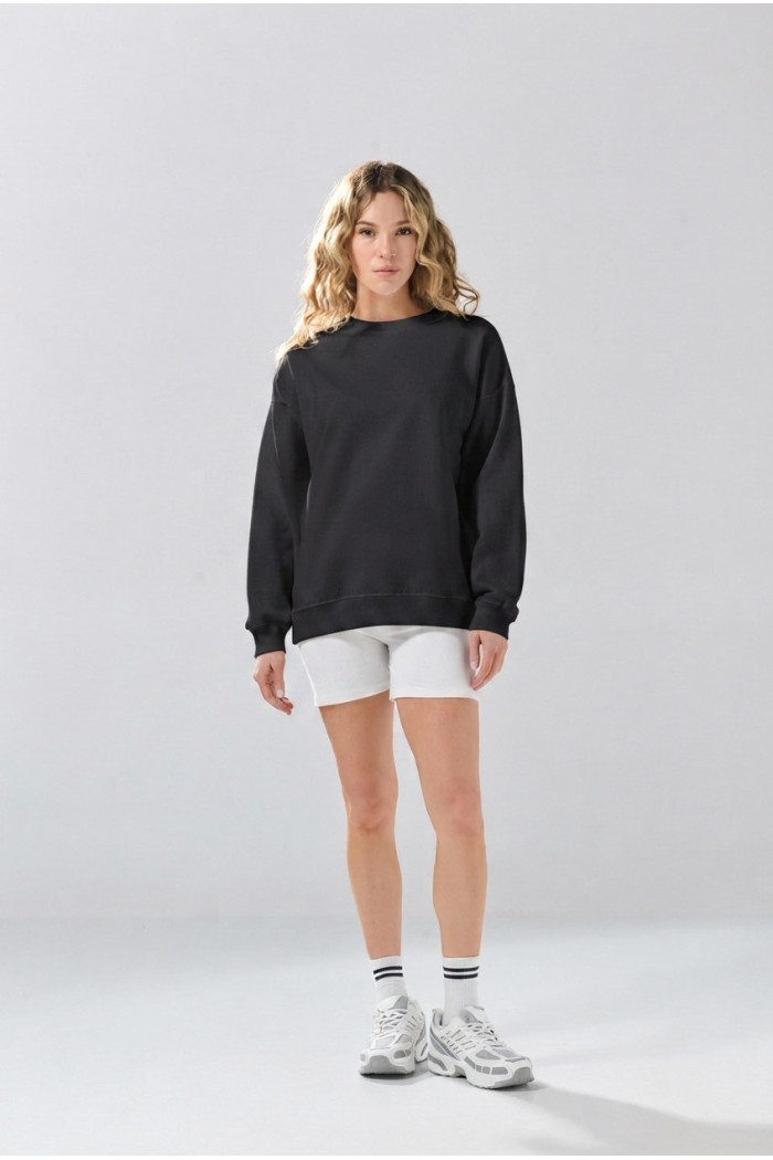 Buzo oversize cuello redondo unicolor con hombro caído
