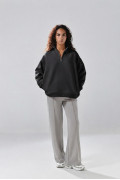 Buzo oversize cuello sport unicolor con cremallera
