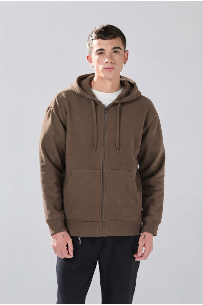 Buzo oversize unicolor con cremallera, cordón y capota