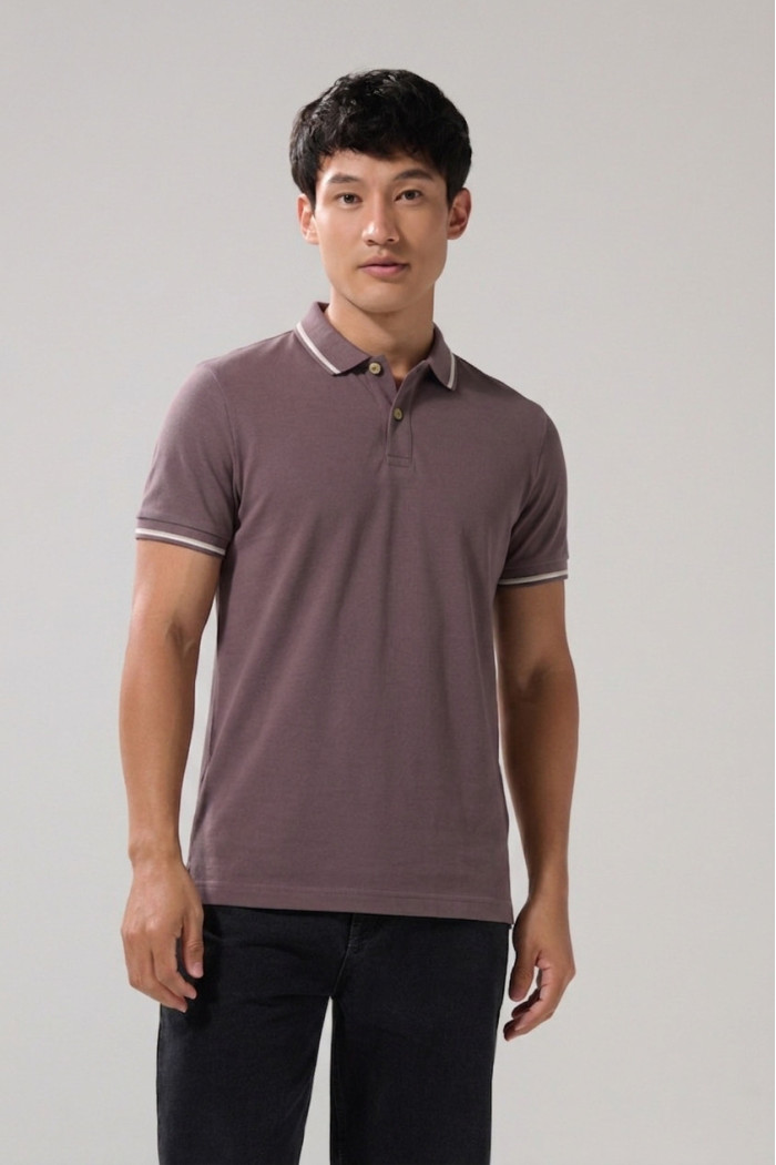 Camiseta polo unicolor con aberturas y manga corta