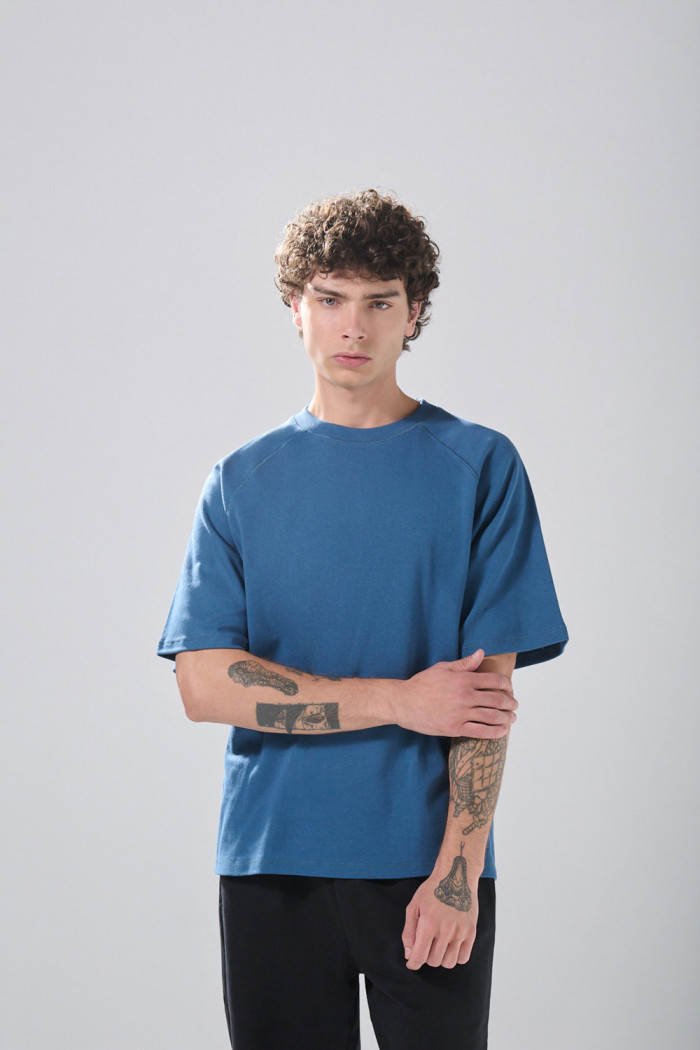 Camiseta en algodón con manga ranglan corta unicolor
