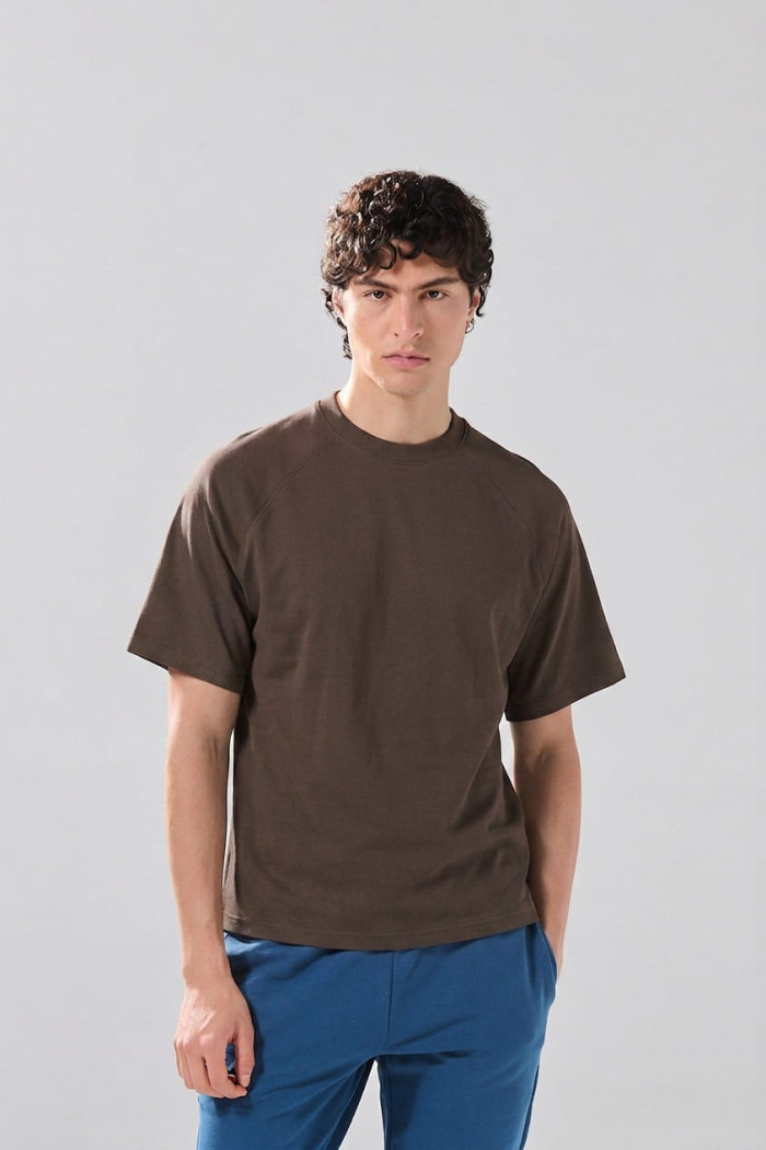 Camiseta en algodón con manga ranglan corta unicolor

