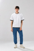 Camiseta oversize con contrastes y manga corta unicolor
