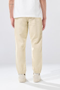 Pantalón tiro bajo jogger unicolor con bolsillos