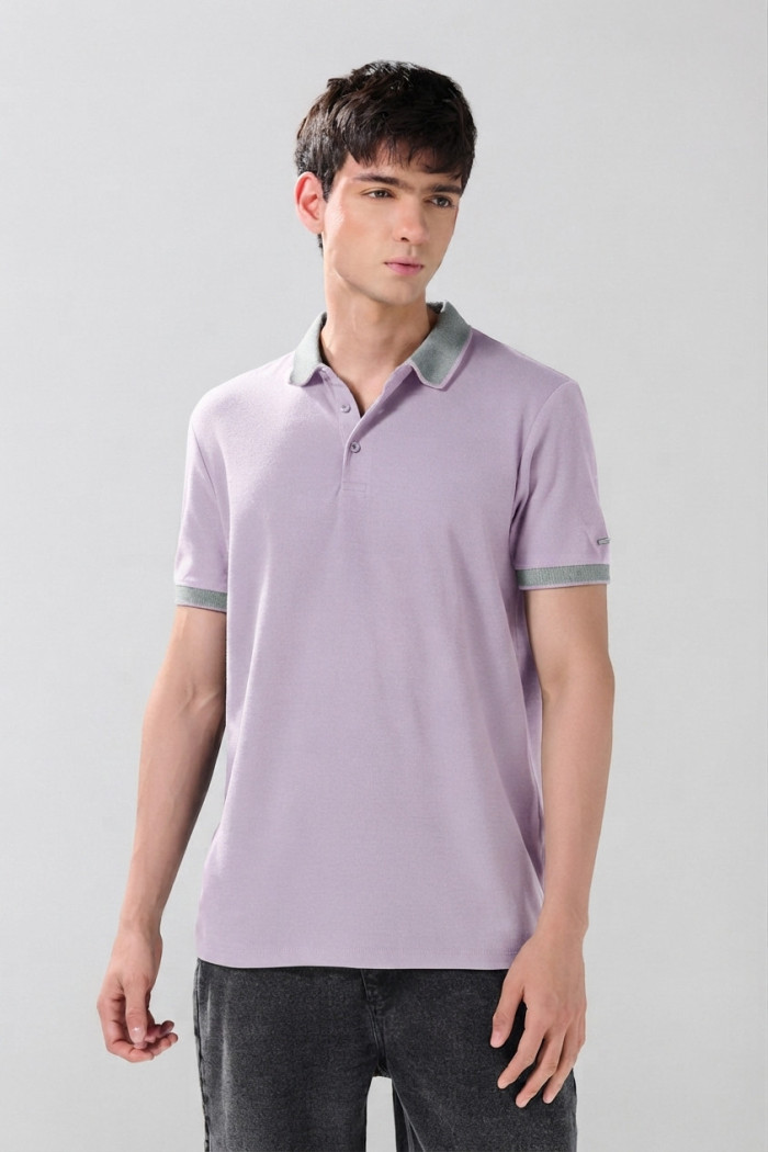 Camiseta polo unicolor manga corta con botones en frente