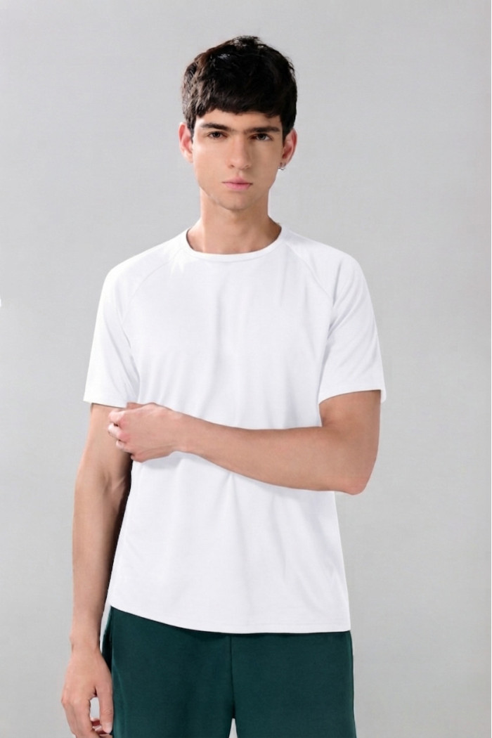 Camiseta en poliester unicolor con manga ranglan corta con estampado deportivo