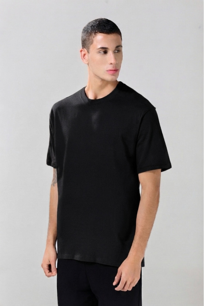 Camiseta en algodón hombro rodado unicolor con manga corta