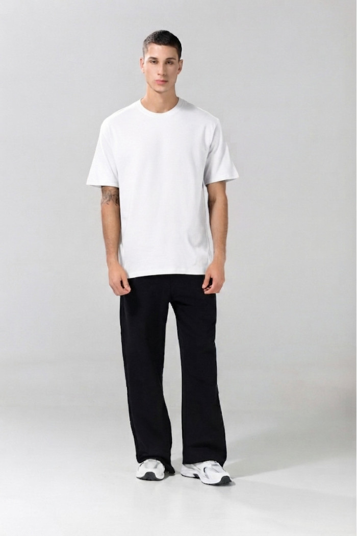 Camiseta en algodón hombro rodado unicolor con manga corta