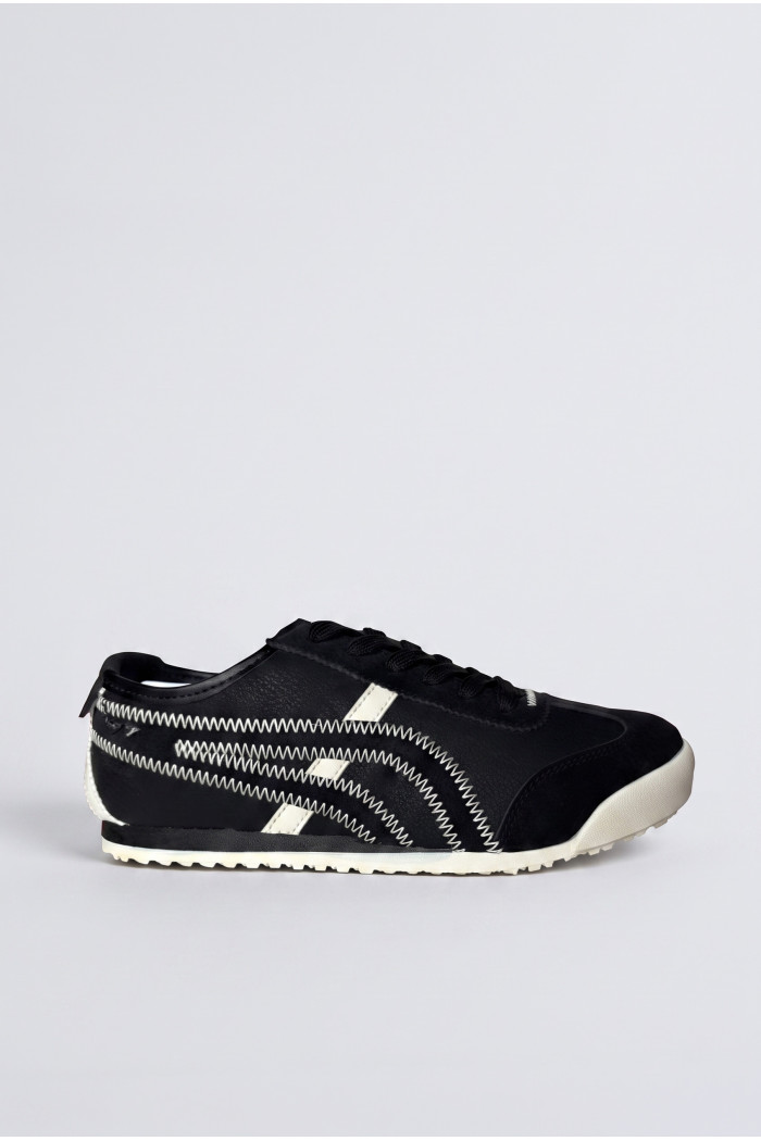 Zapatillas de estilo clásico, suela de caucho de perfil bajo.