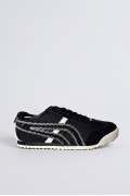 Zapatillas de estilo clásico, suela de caucho de perfil bajo.
