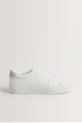 Zapatillas de estilo clásico, suela de caucho de perfil bajo.
