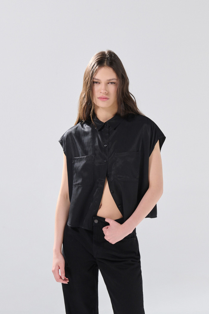 Blusa manga corta unicolor con nudo y estampados